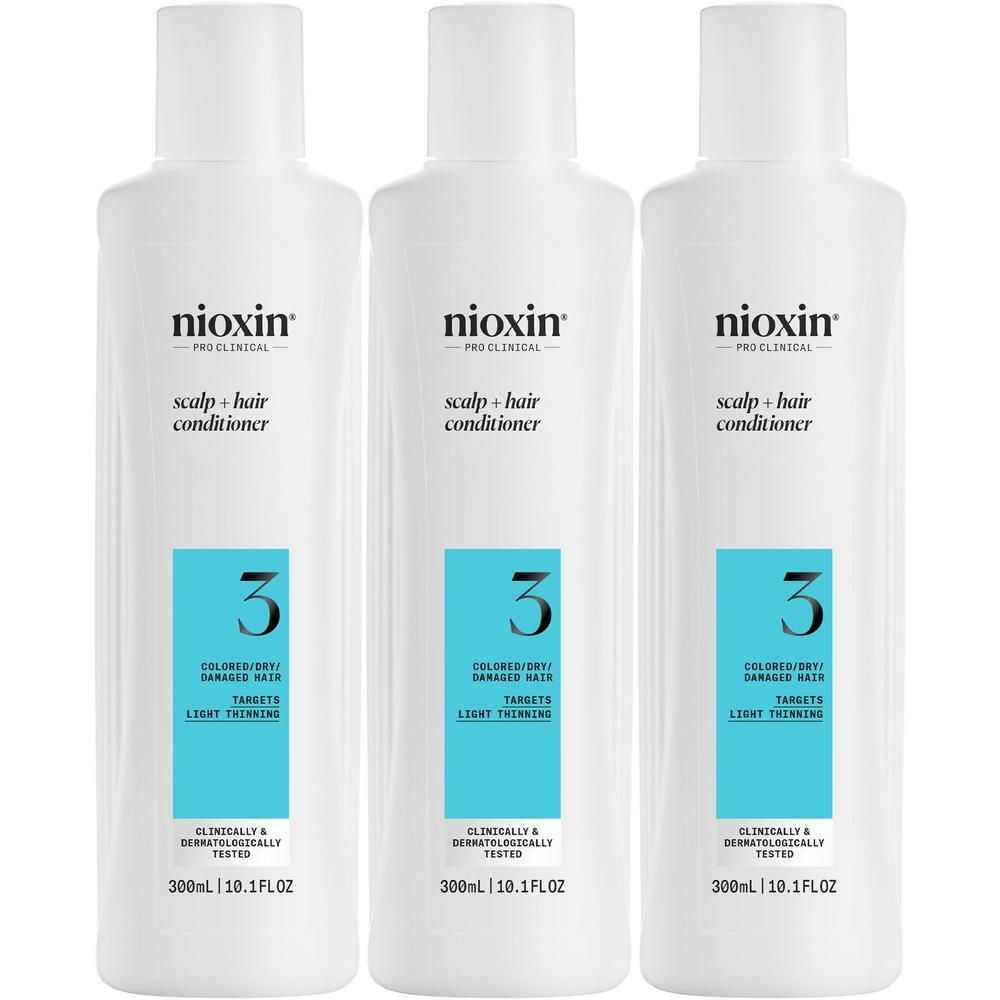 Drie witte Nioxin Systeem 3 conditioner flacons voor gekleurd, beschadigd haar, 300ml.