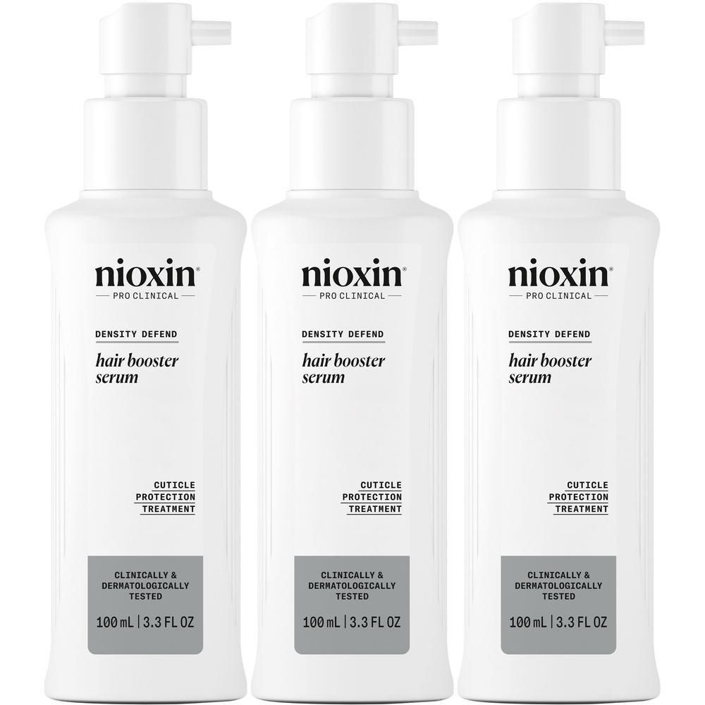 Drie witte pompflesjes Nioxin Hair Booster Serum, 100ml.