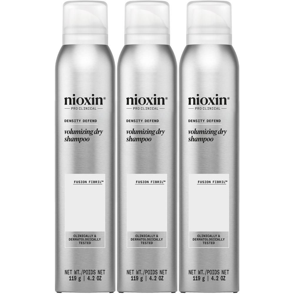 Trois aérosols de shampooing sec volumateur Nioxin.