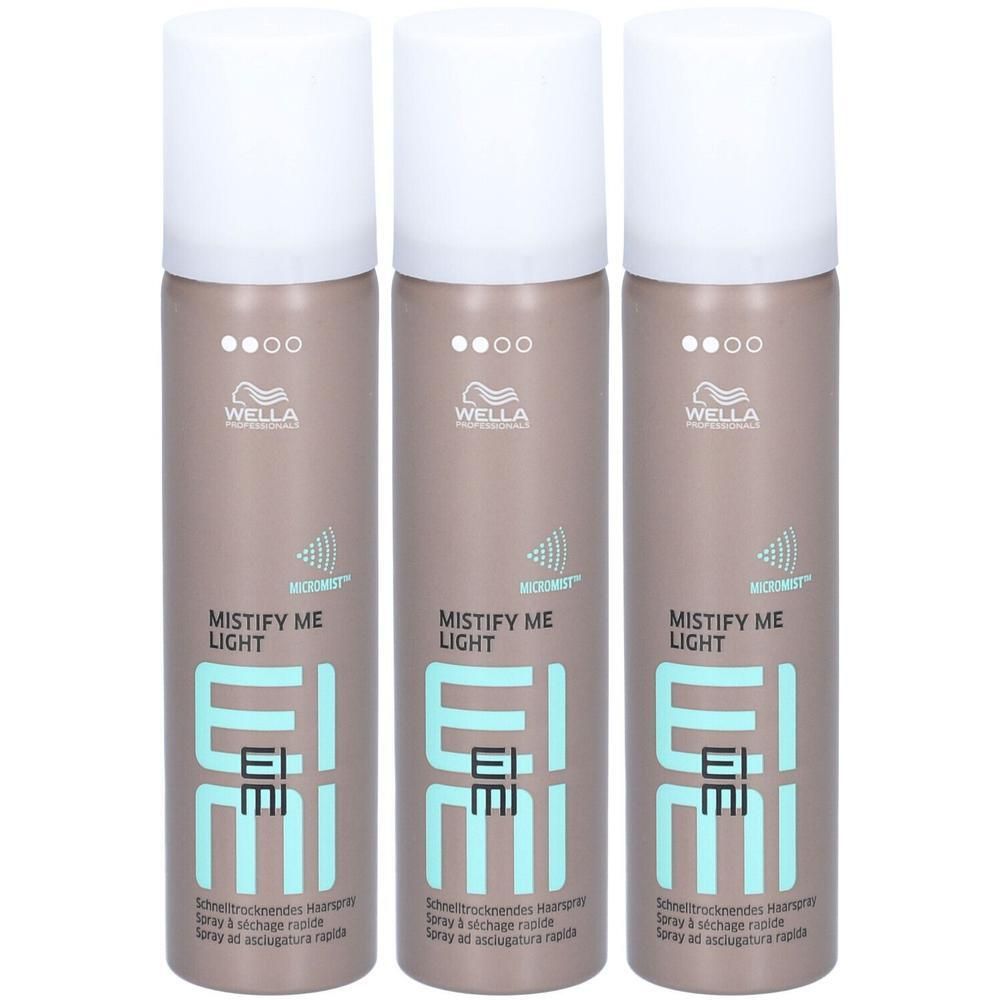 Trois flacons de spray Wella Professionals Mistify Me Light avec bouchons blancs.
