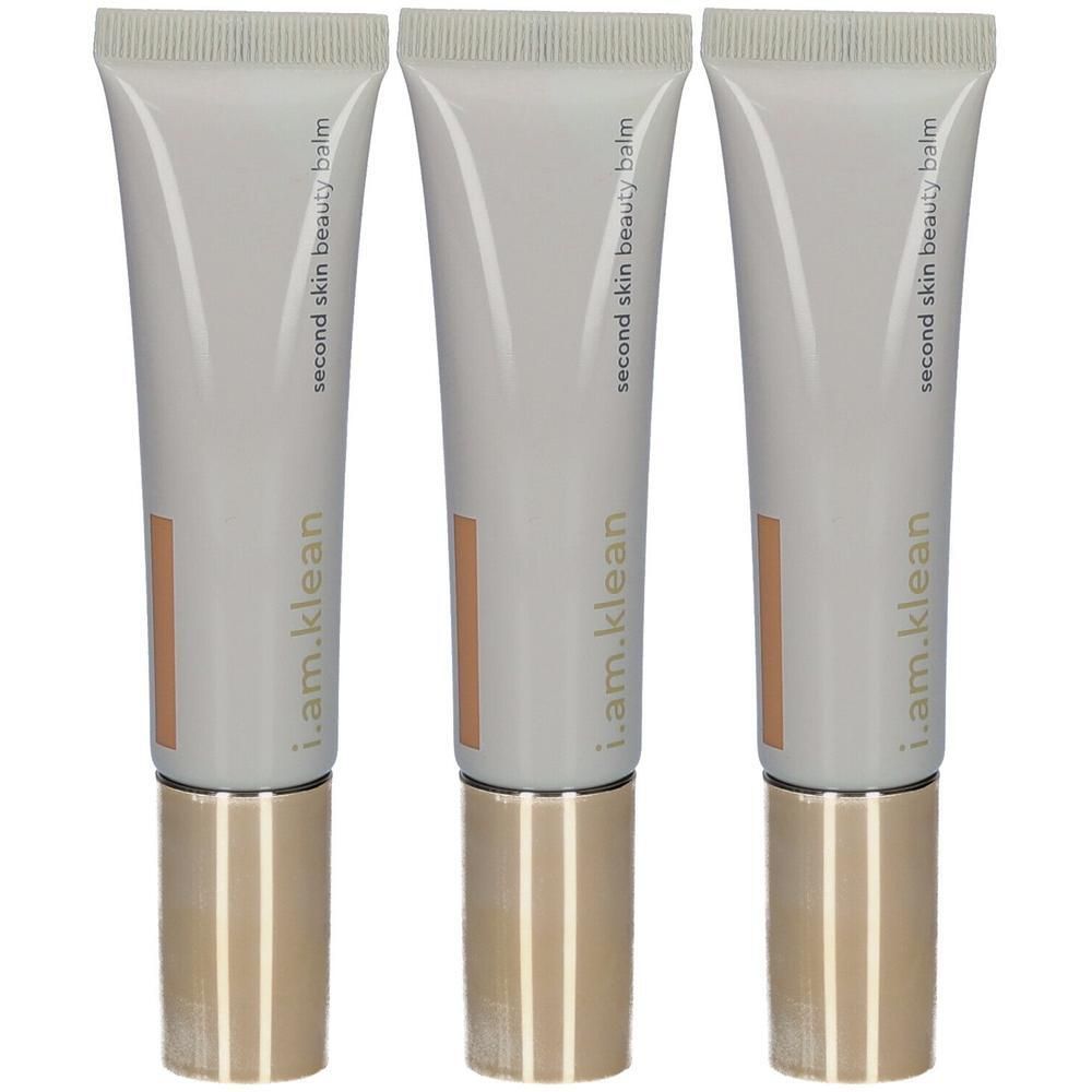 Drie tubes "Second Skin Beauty Balm" van i.am.klean met gouden doppen.