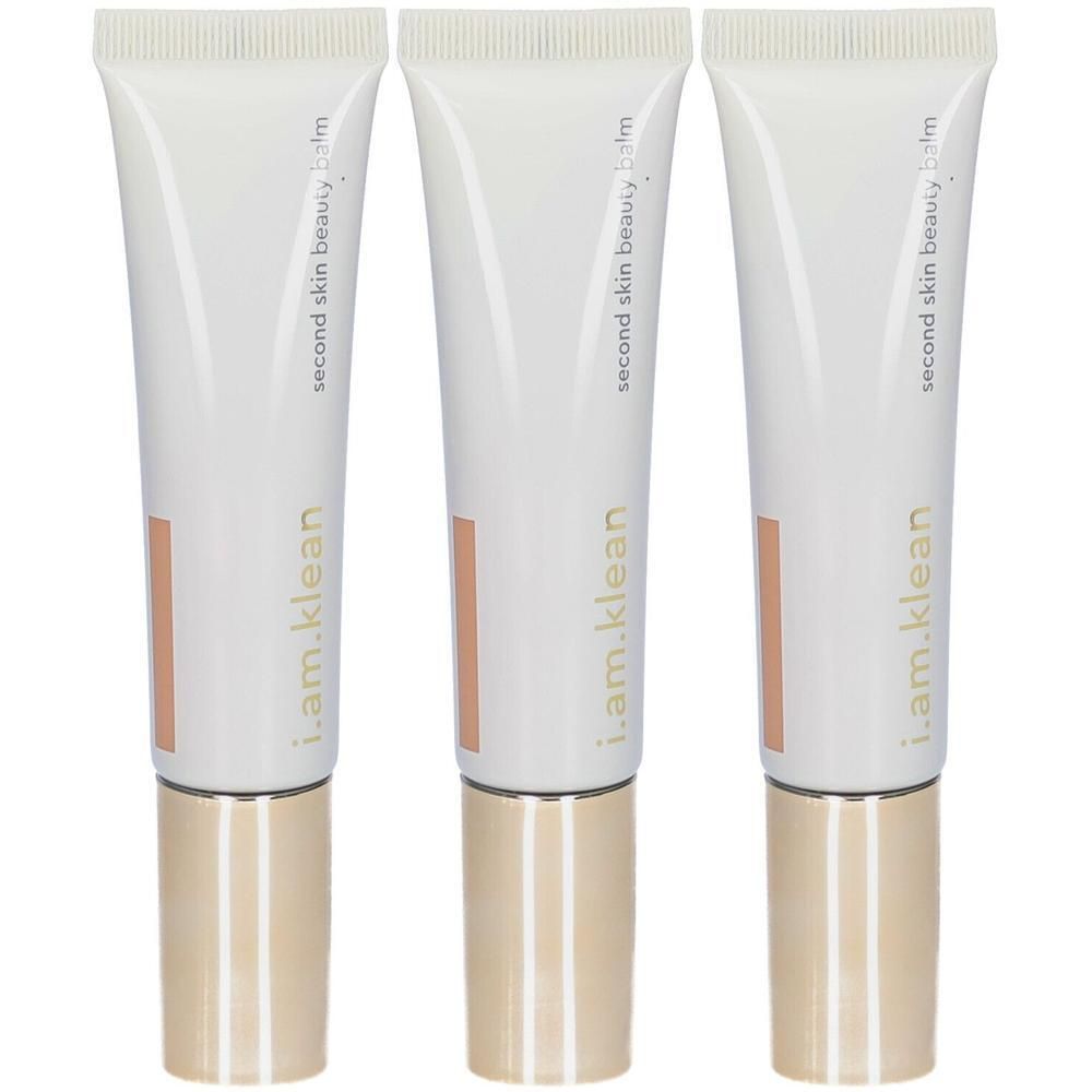 Drie witte tubes met goudkleurige dop, voorzien van 'i.am.klean second skin beauty balm'.
