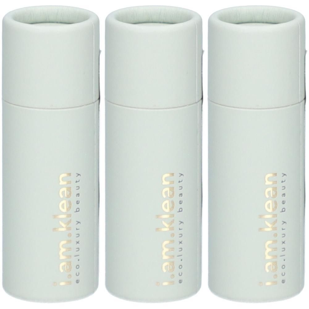 Drie witte buisvormige verpakkingen met gouden tekst 'i.am.klean eco.luxury beauty'.