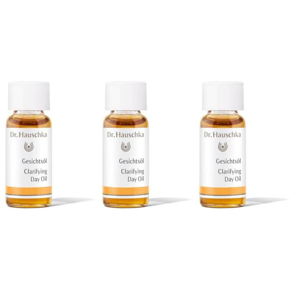 Trois flacons d'huile visage Dr. Hauschka Clarifying Day Oil.