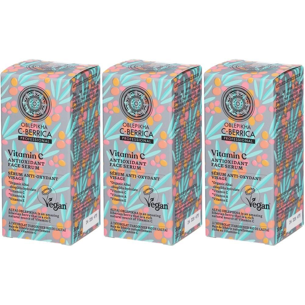 Trois boîtes de sérum visage antioxydant à la vitamine C, motif végétal, sceau Vegan.
