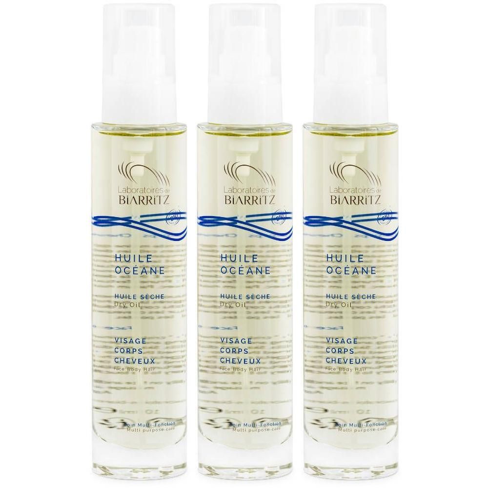 Trois flacons d'Huile Sèche Océane Laboratoires de Biarritz pour visage, corps et cheveux.
