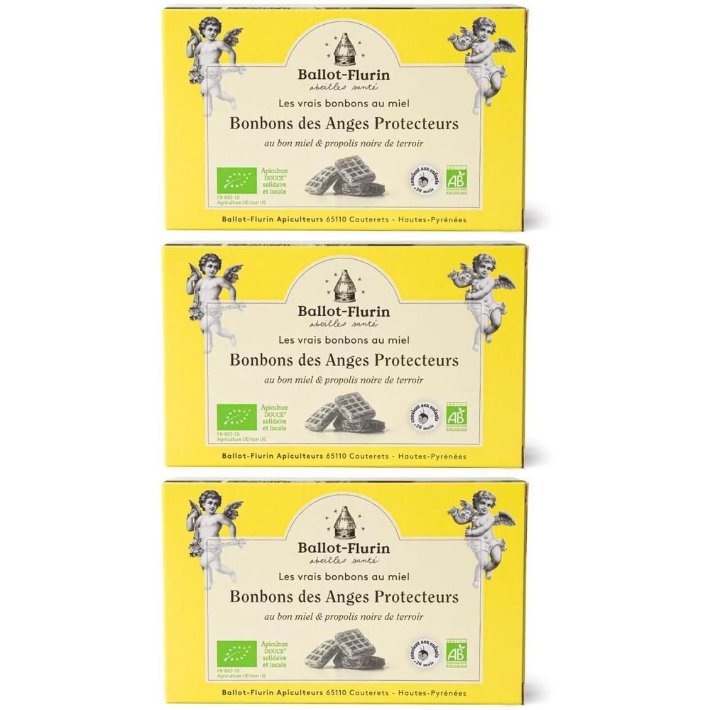 Trois boîtes jaunes de Ballot-Flurin Bonbons des Anges Protecteurs. Montre des anges et un motif de nid d'abeille.