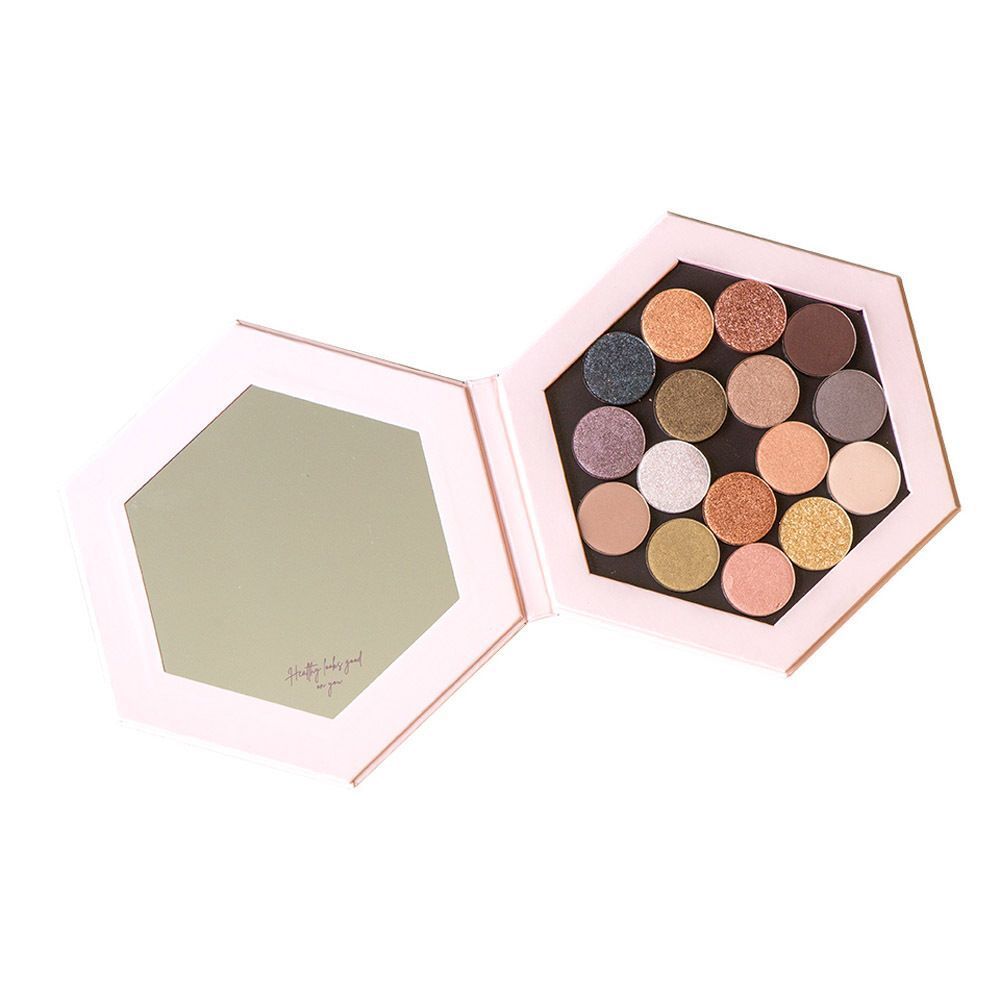 Palette maquillage hexagonale ouverte avec miroir et 16 fards à paupières.