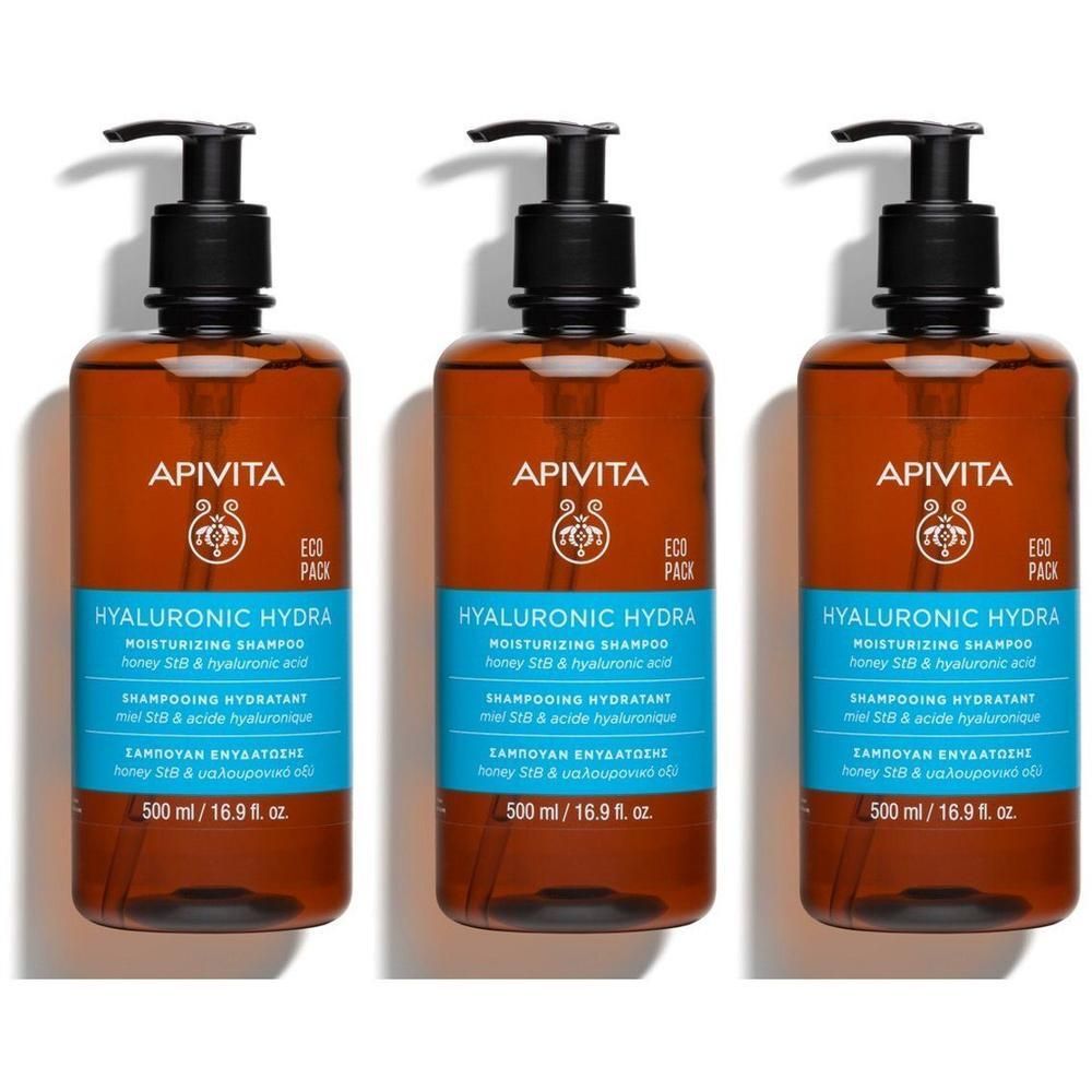 Trois bouteilles de shampoing hydratant Apivita Hyaluronic Hydra avec distributeurs à pompe.