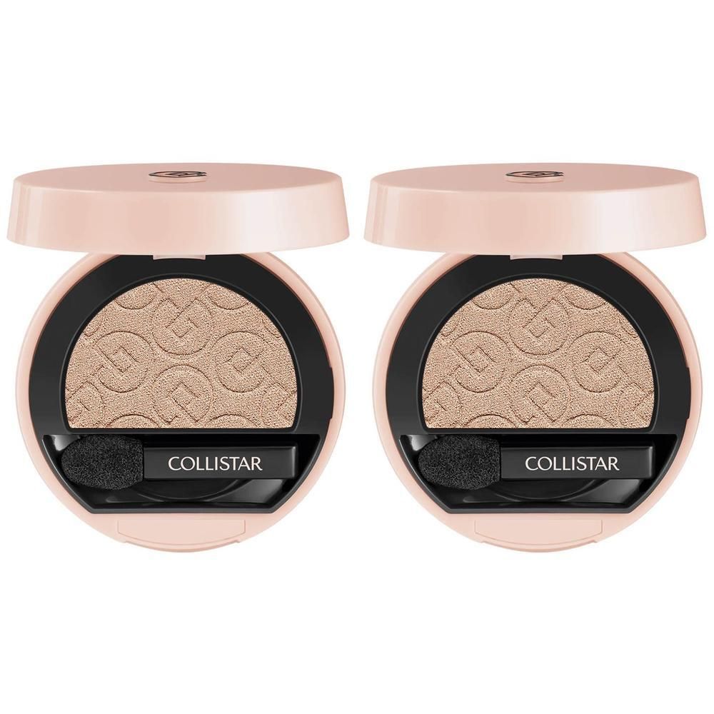 Twee geopende compacte oogschaduwdoosjes in champagnekleur met applicator.