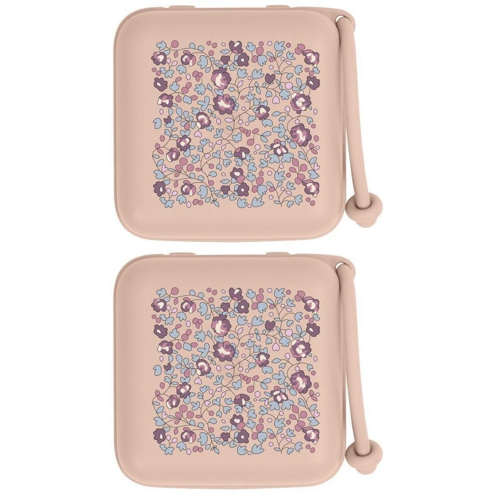 Deux boîtes à sucettes roses avec un motif floral.
