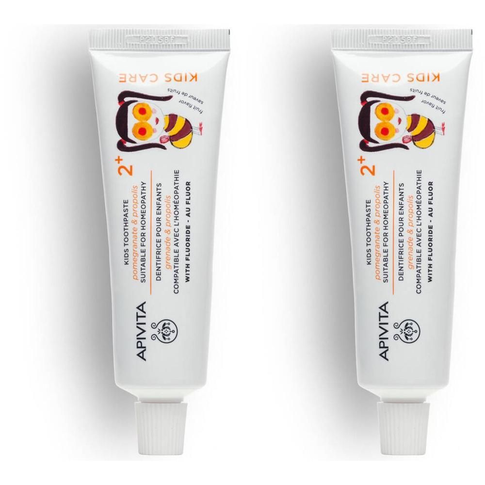 Deux tubes de dentifrice Apivita pour enfants à la grenade et propolis, dès 2 ans.