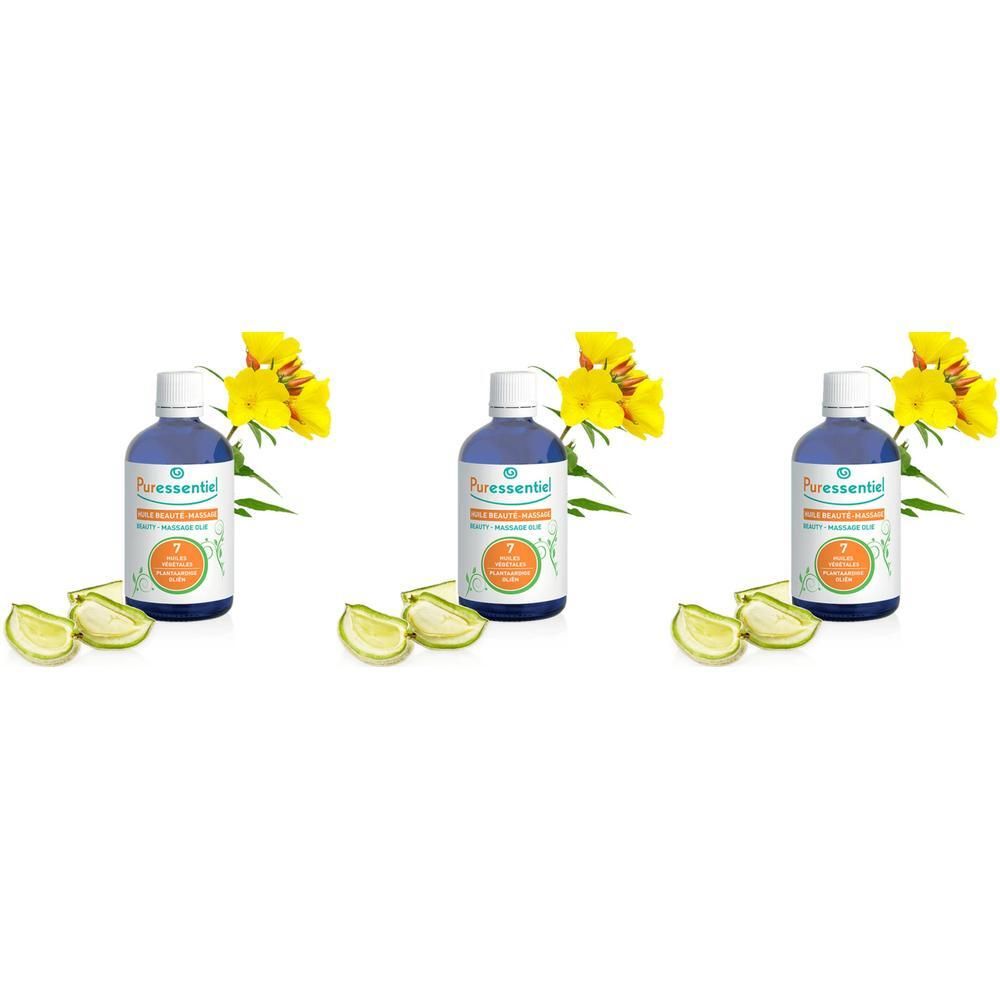 Trois flacons d'huile de massage Puressentiel Huile Beauté avec fleurs jaunes et tranches de citron.