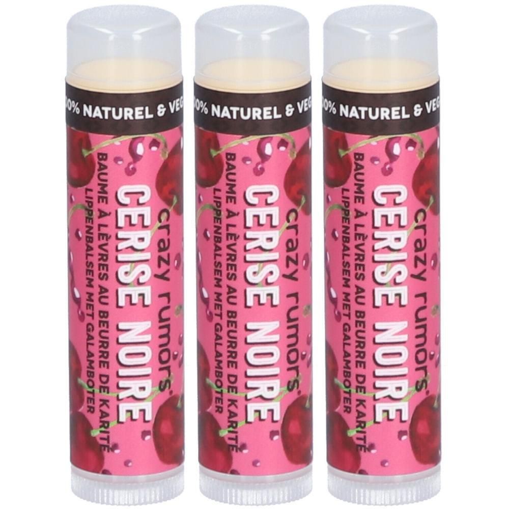 Trois baumes à lèvres Cerise Noire sur fond rose avec des cerises.