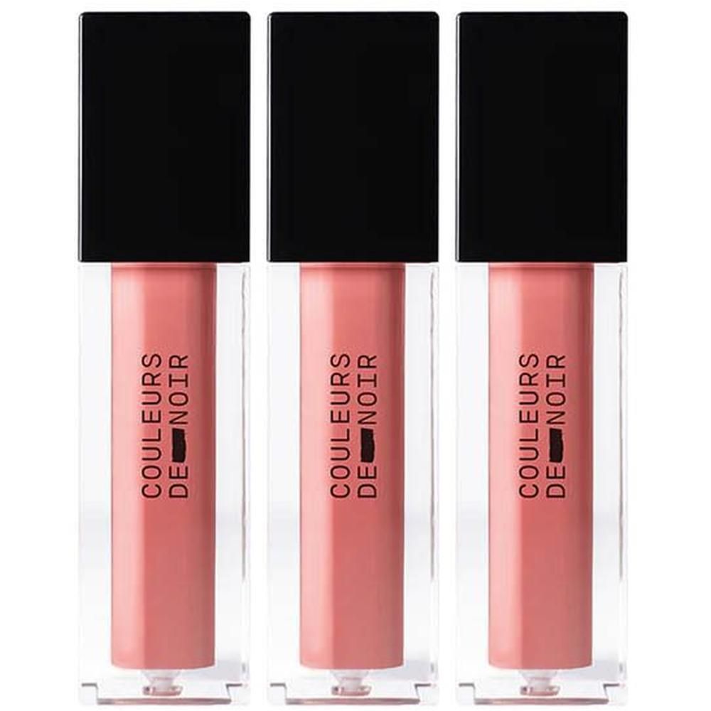 Drie flesjes Couleurs de Noir Instant Gloss Lip Maximizer in doorzichtige houders met zwarte doppen.
