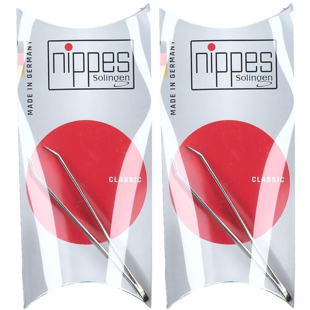 Deux pinces à épiler Nippes à embouts pointus, emballées sous blister.
