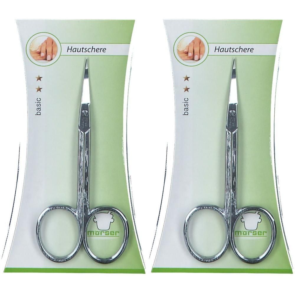 Twee metalen huidknippers in blisterverpakking. "basic" en "Mörser" zijn zichtbaar.