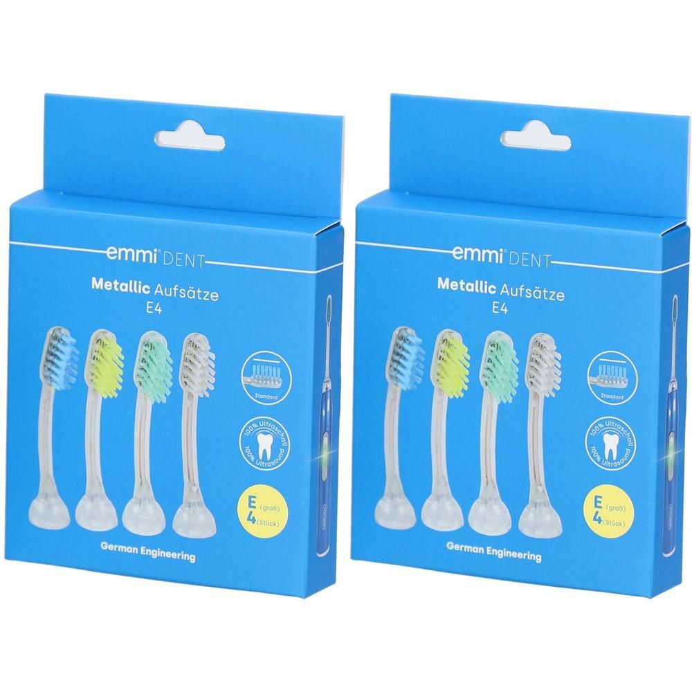 Deux paquets de têtes de brosse Emmi-Dent E4, quatre têtes par paquet, couleurs variées.