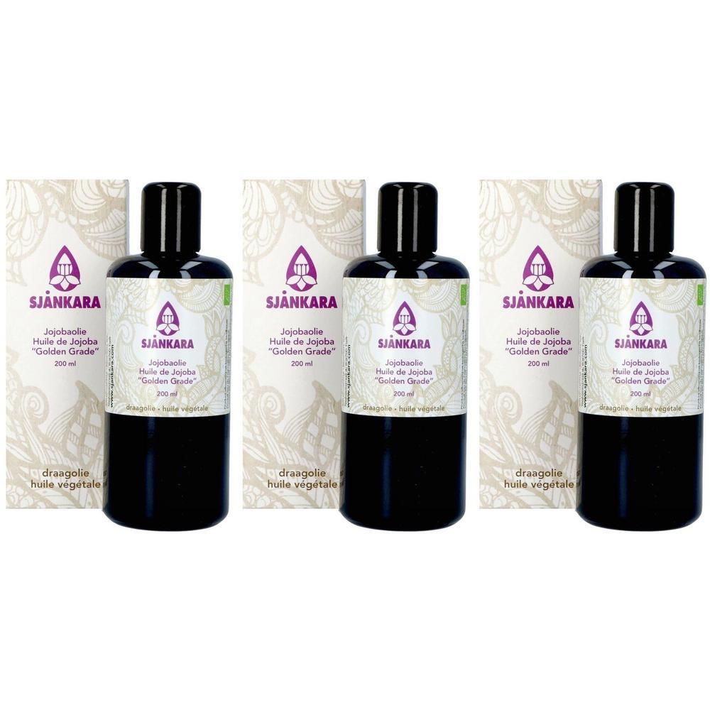 Drie donkere flessen Sjankara Jojobaolie "Golden Grade" 200ml met verpakking.