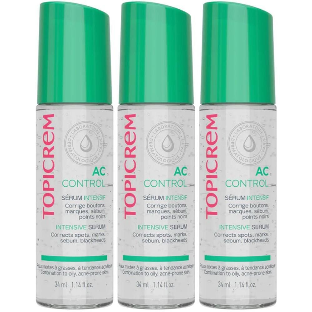 Drie flacons Topicrem AC Control Intensief Serum met groene dopjes.