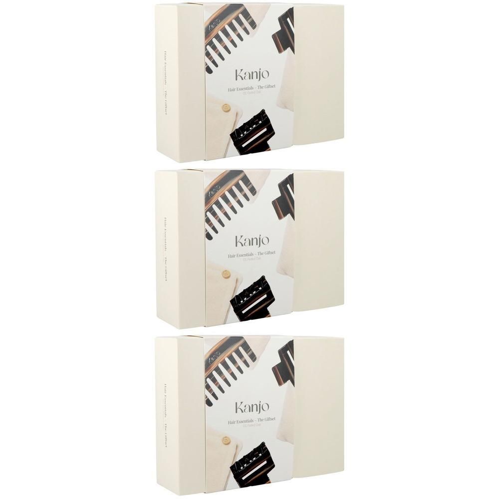 Trois coffrets cadeaux Kanjo Hair Essentials en chêne délavé.