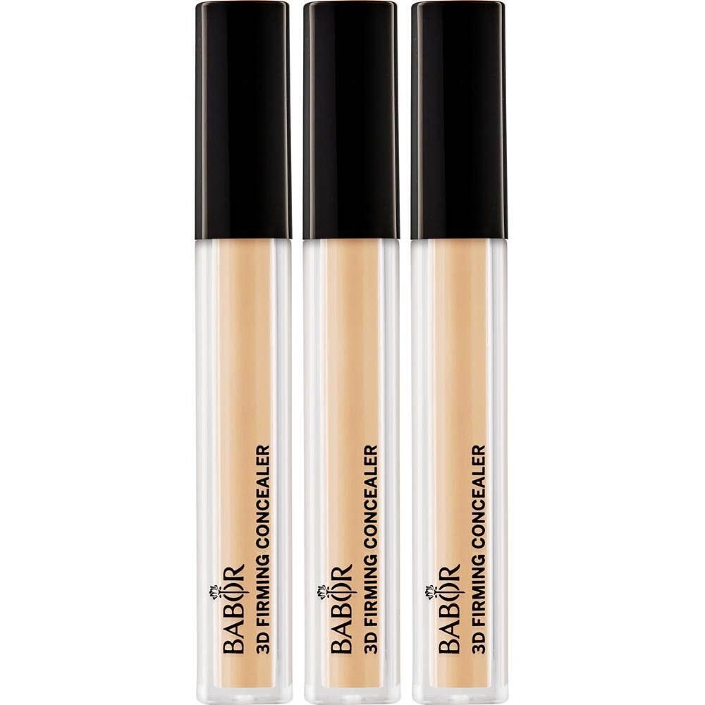 Drie Babor 3D Firming Concealer in de kleur Tan in doorzichtige tubes met zwarte doppen.