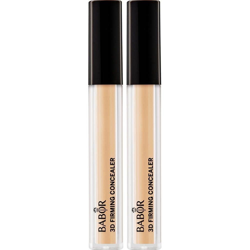 Twee Babor 3D Firming Concealer in Tan kleur in doorzichtige tubes met zwarte doppen.