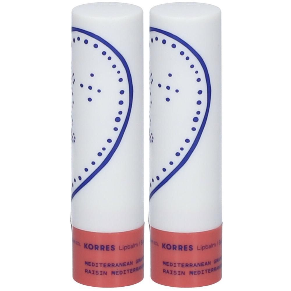 Twee Korres lippenbalsems met mediterraan rozijnen design.