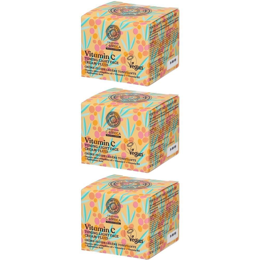 Trois boîtes de crème-fluide visage tonifiante légère à la vitamine C, motif floral.