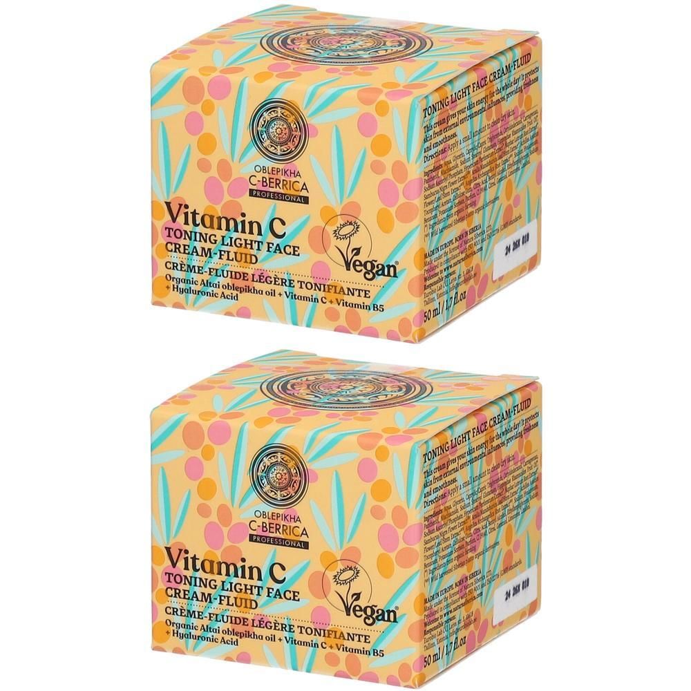 Twee verpakkingen Vitamin C Toning Light Face Cream-Fluid met vegan keurmerk.