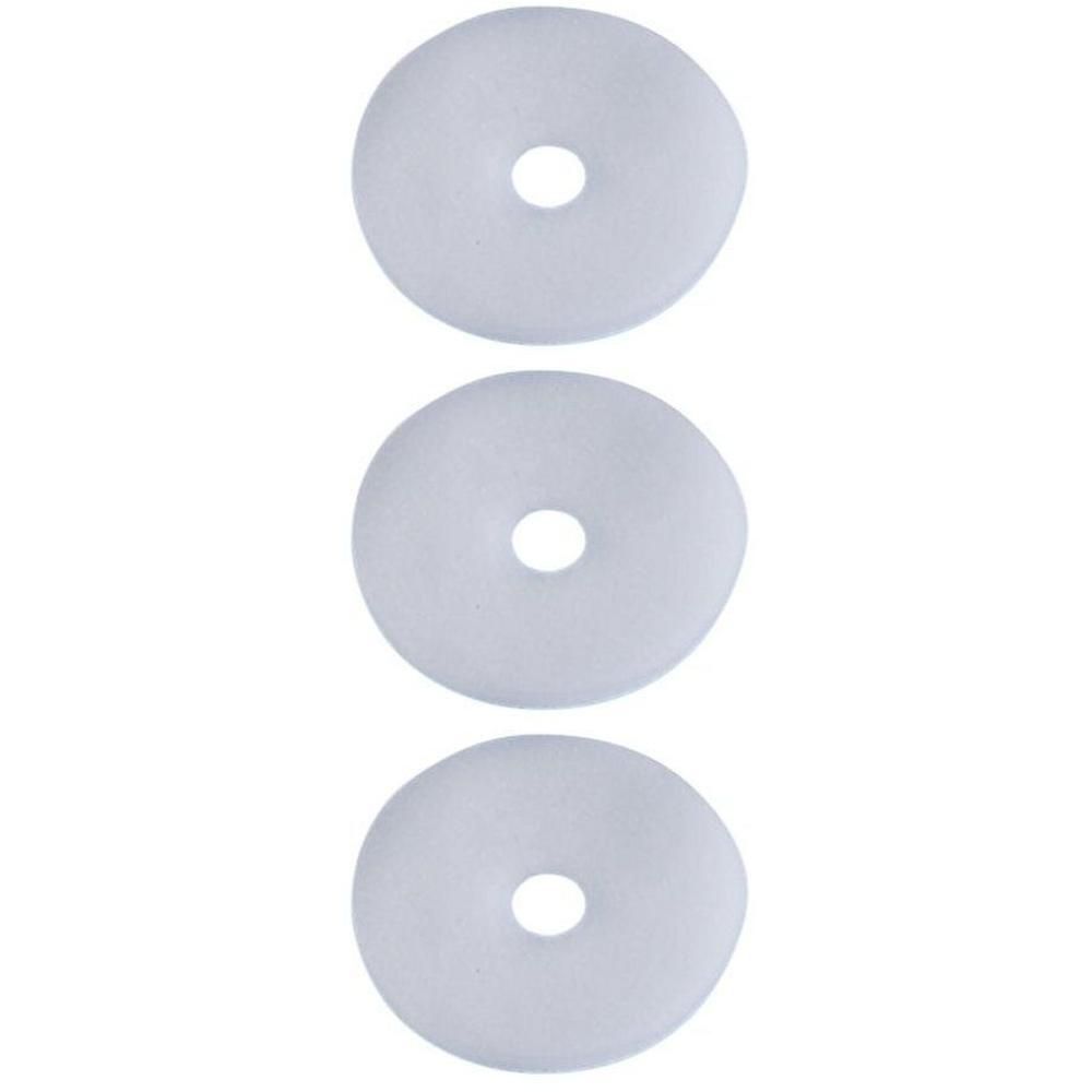 Trois protecteurs ronds pour maïs avec un trou central.