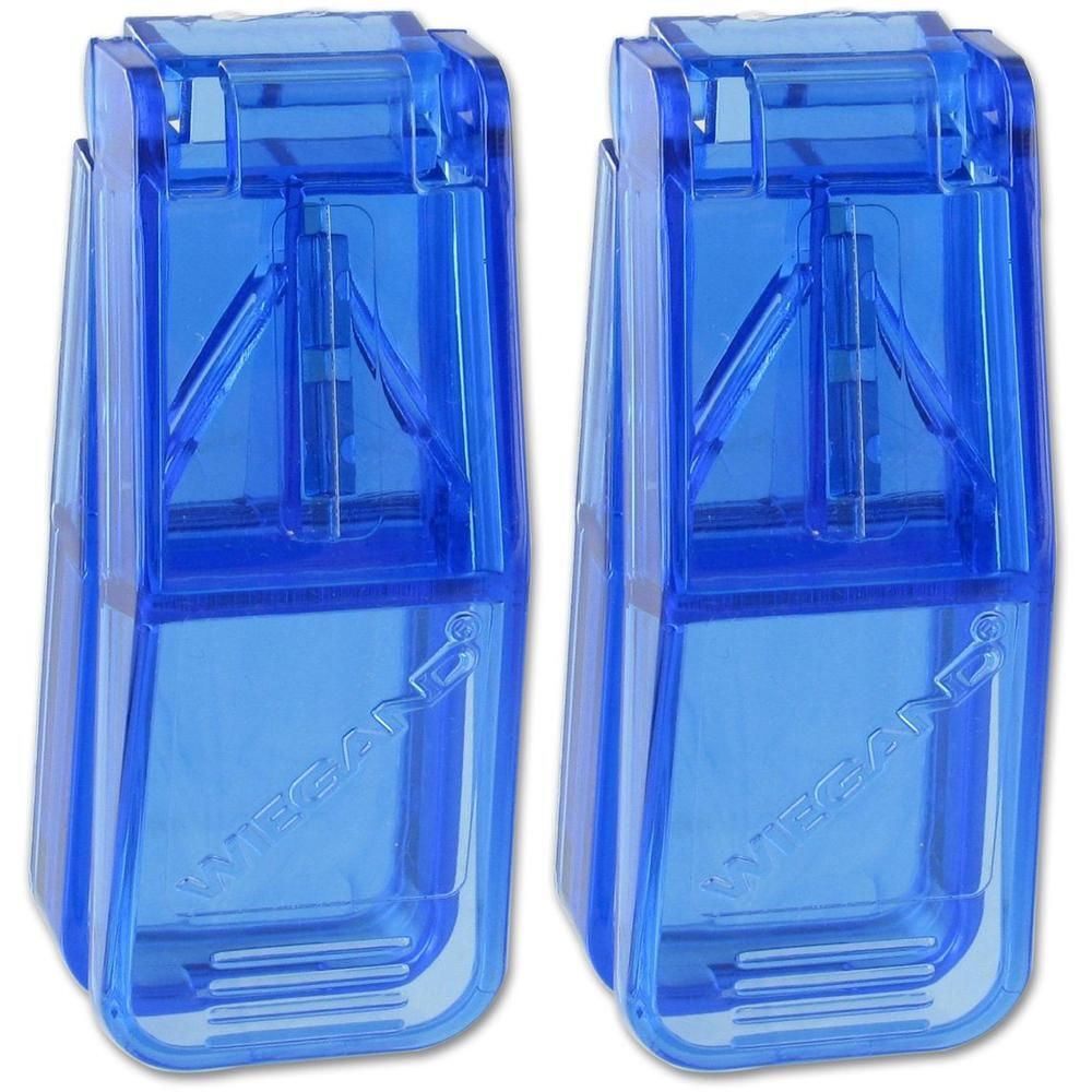 Twee blauwe pillensnijders van plastic met zichtbaar mechanisme.