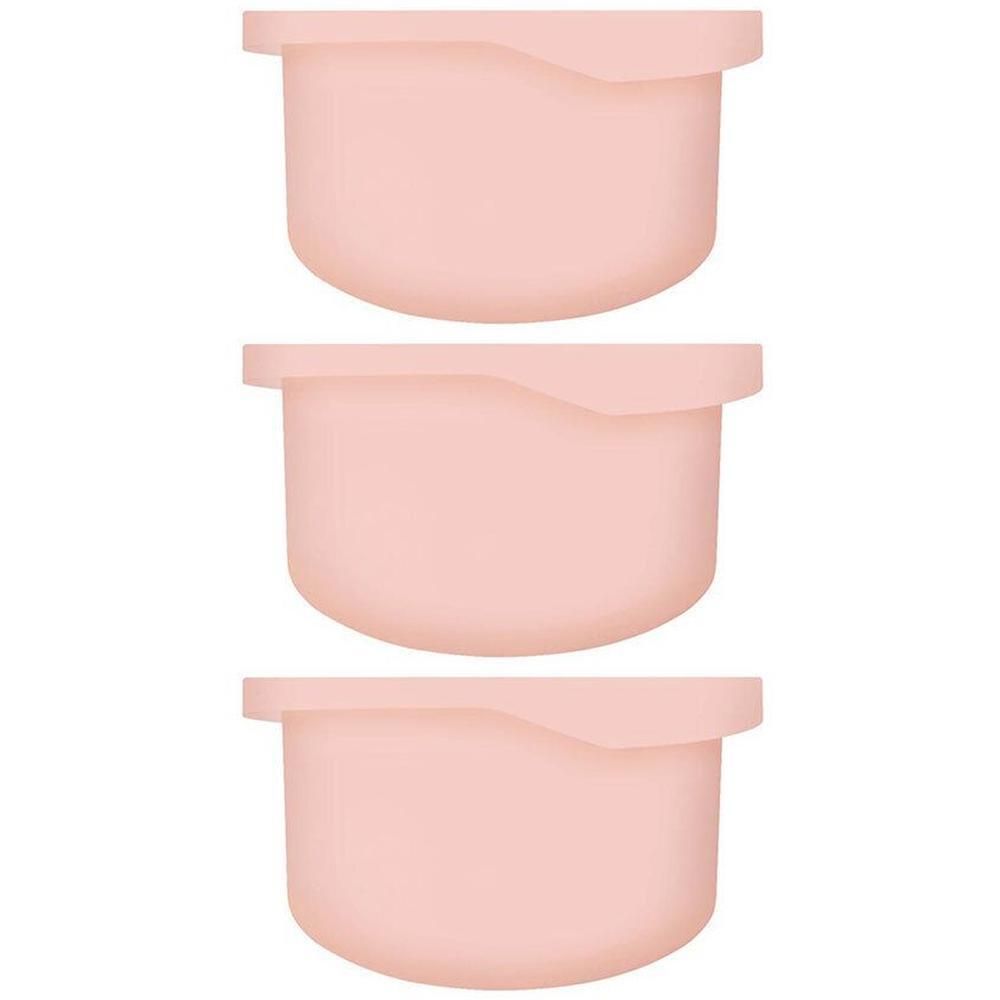 Trois contenants roses avec couvercle, empilés les uns sur les autres.
