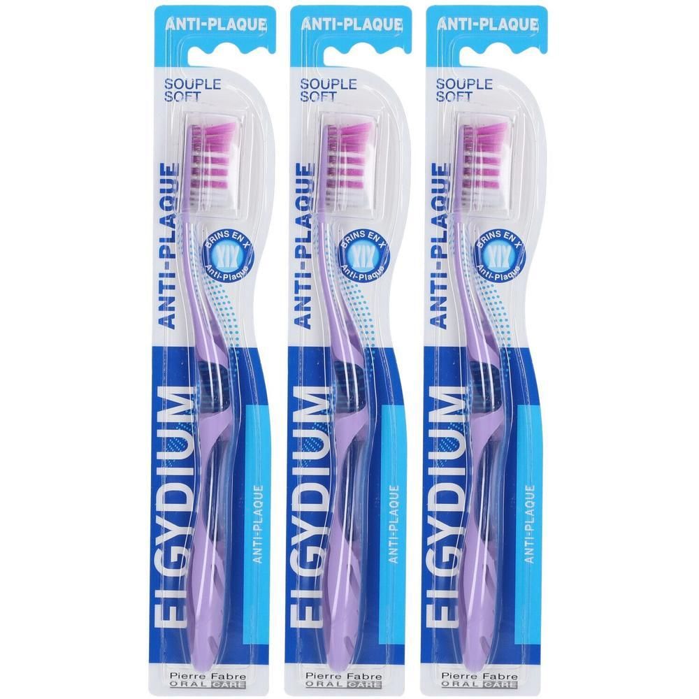 Drie Elgydium Anti-Plaque tandenborstels, paars, met zachte borstels.