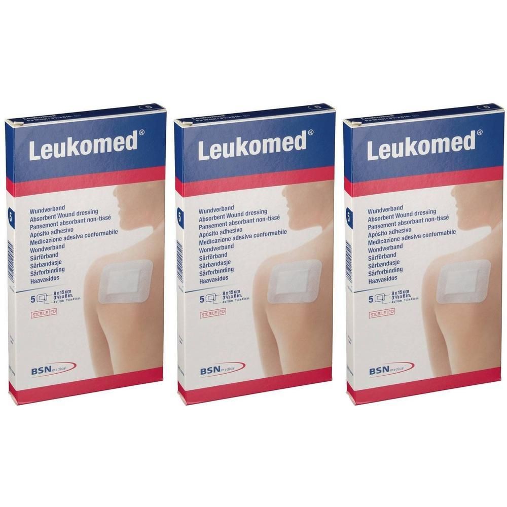 Drie pakken Leukomed verbanden, 8x15cm. Toont schouder met verband.