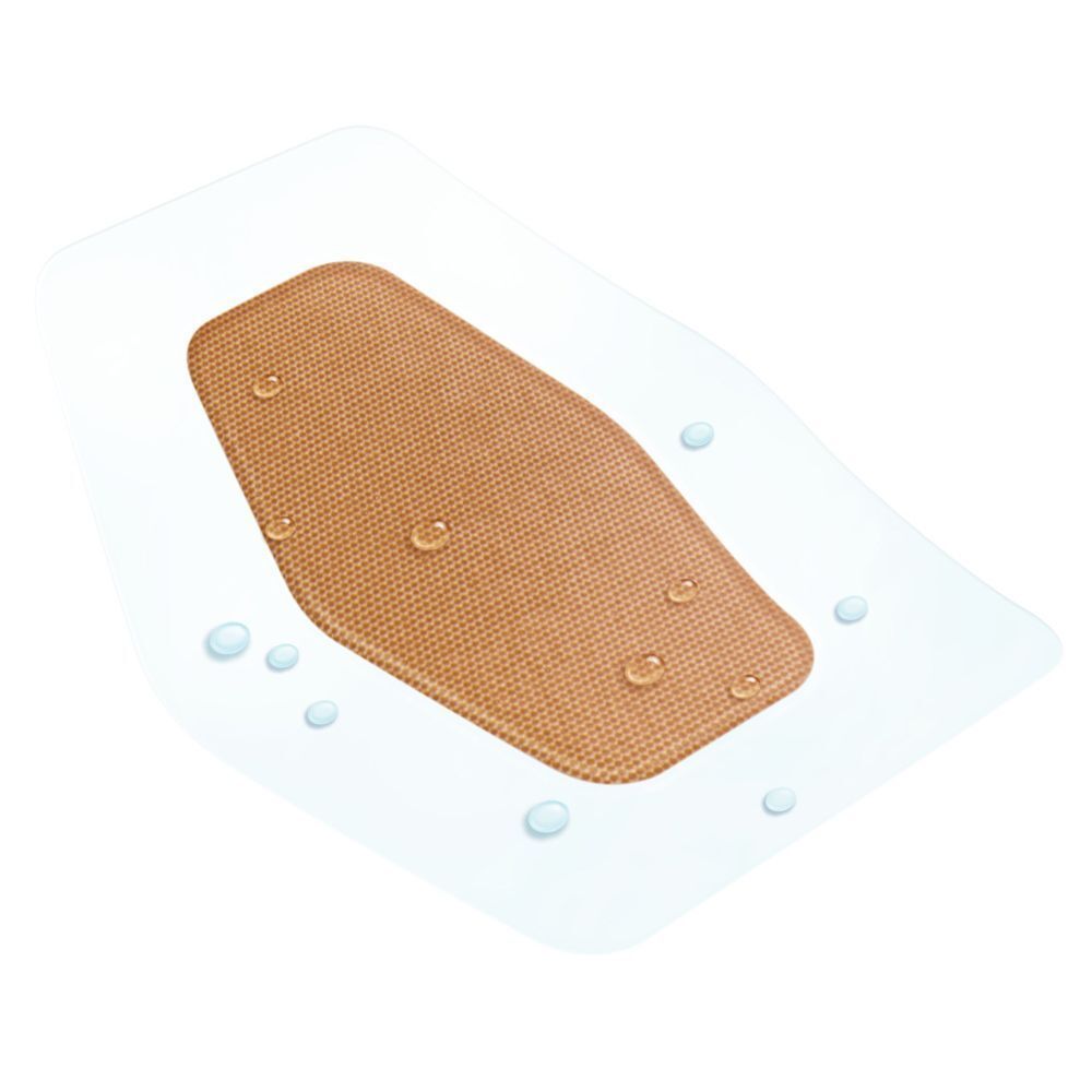 Een Nexcare Aqua Clear pleister met waterdruppels, toont waterdichtheid.