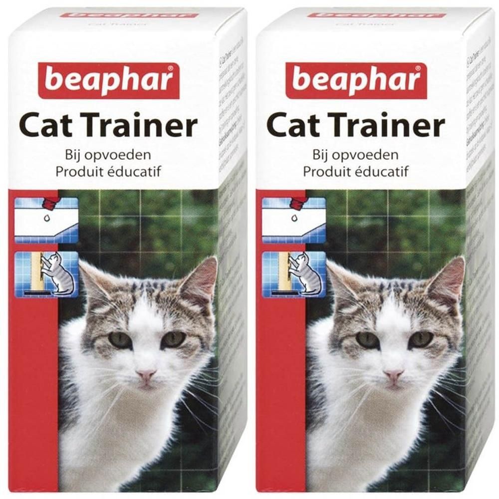 Deux paquets de Beaphar Cat Trainer avec image de chat et instructions d'utilisation.