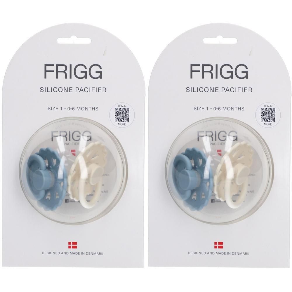 Deux sucettes en silicone FRIGG, taille 1 (0-6 mois), bleues et crème.
