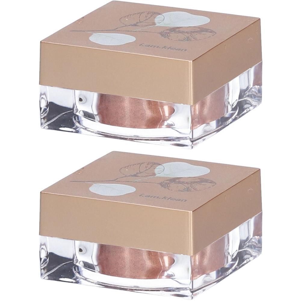 Twee vierkante potjes met koperkleurige minerale oogschaduw. Gouden deksels met bloemenpatroon.