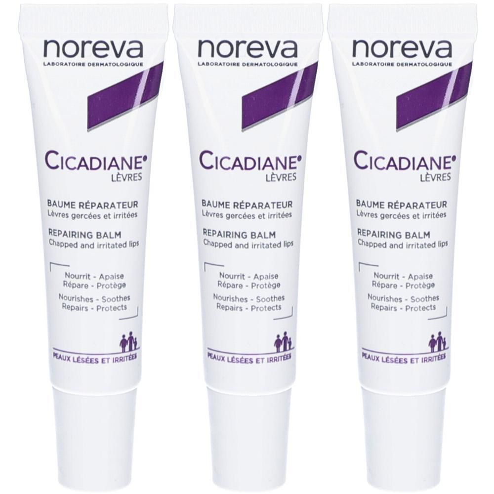 Trois tubes de baume à lèvres Noreva Cicadiane. Blanc avec des accents violets. Pour lèvres gercées et irritées.
