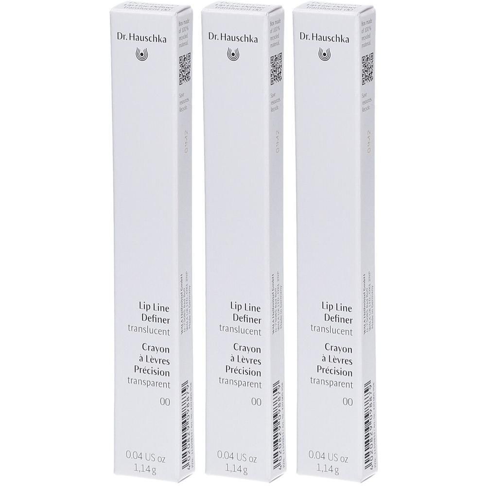 Trois crayons à lèvres Dr. Hauschka 00 Translucent dans leurs emballages blancs.
