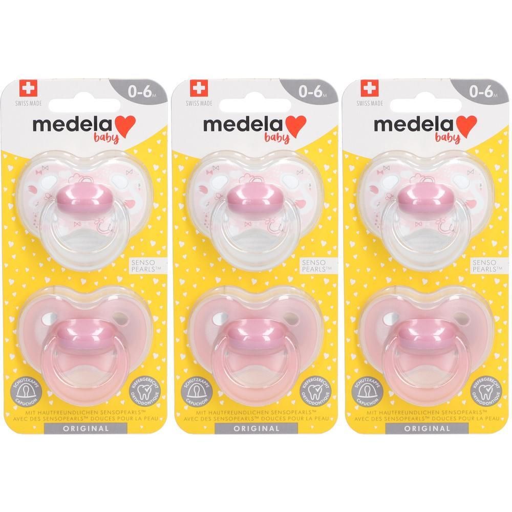 Drie roze Medela Original fopspenen voor 0-6 maanden, in individuele verpakkingen.