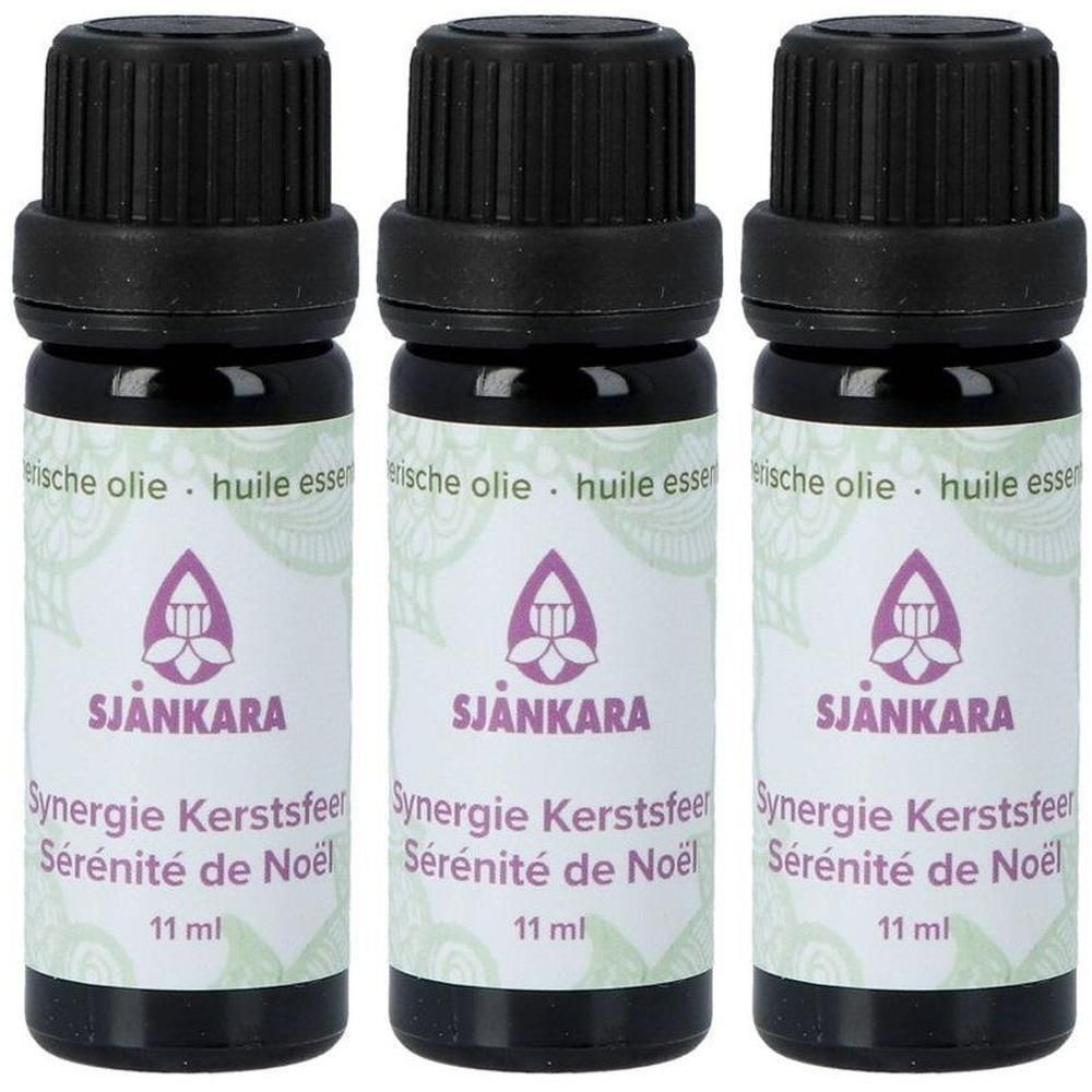 Trois flacons de 11 ml d'huile essentielle "Synergie Kerstsfeer" avec bouchon noir et étiquette logo violet.