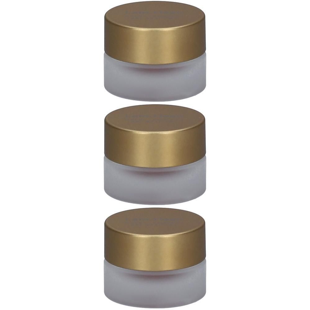 Trois petits pots en verre dépoli avec des couvercles à vis dorés.