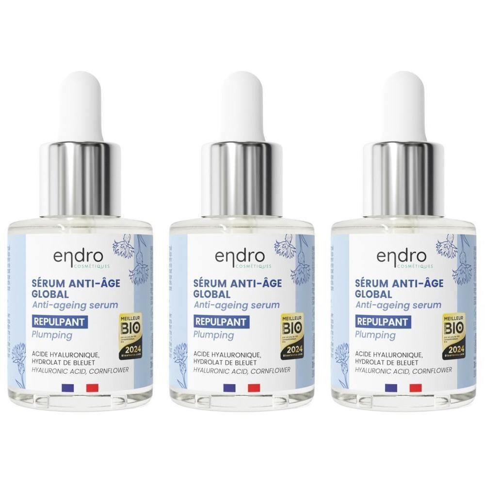Drie flacons Endro Anti-aging serum met druppelflesje. Blauwe etiketten met bloemenpatroon en Bio-keurmerk.
