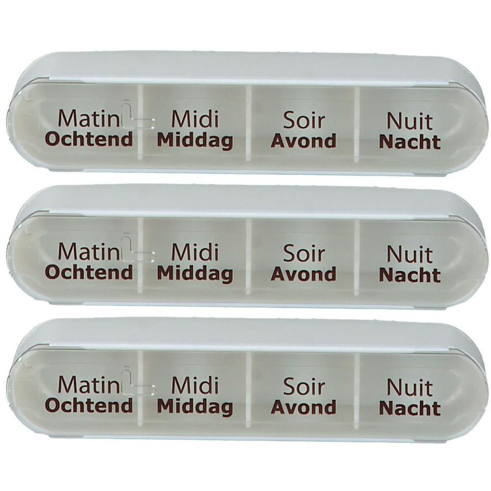 Drie witte pillendoosjes met elk vier vakjes voor ochtend, middag, avond en nacht.