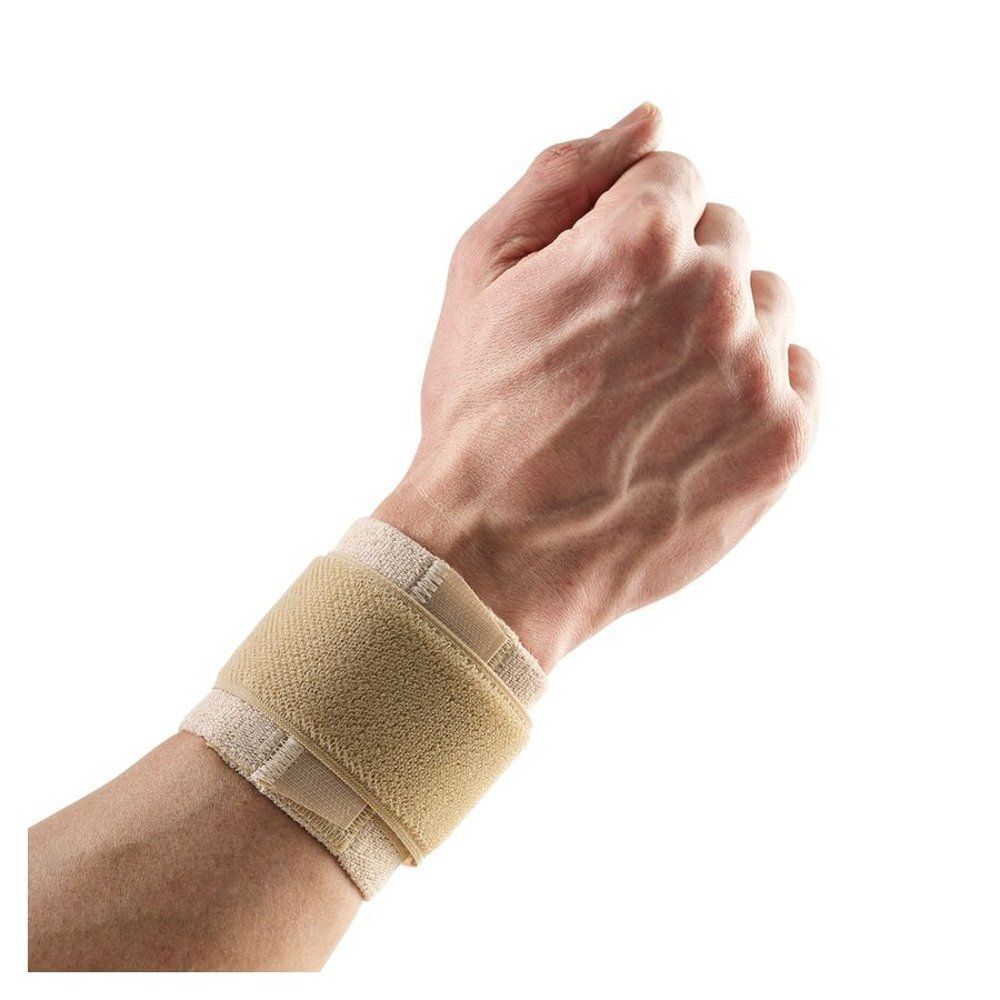 Support de poignet Bota avec velcro, beige, taille M, porté sur un poignet.