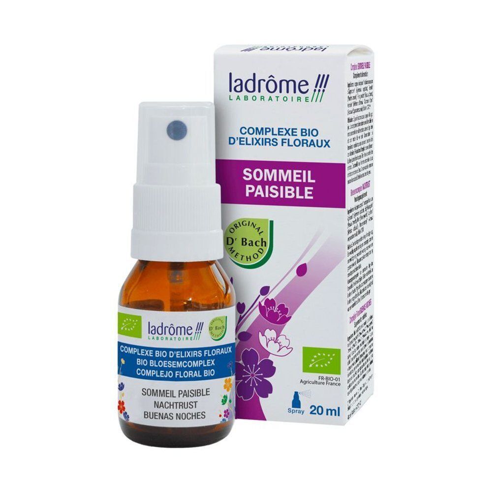 Een fles Ladrome Bio-Bloesemcomplex Spray naast het doosje. Bruin glazen flesje met witte sproeikop.
