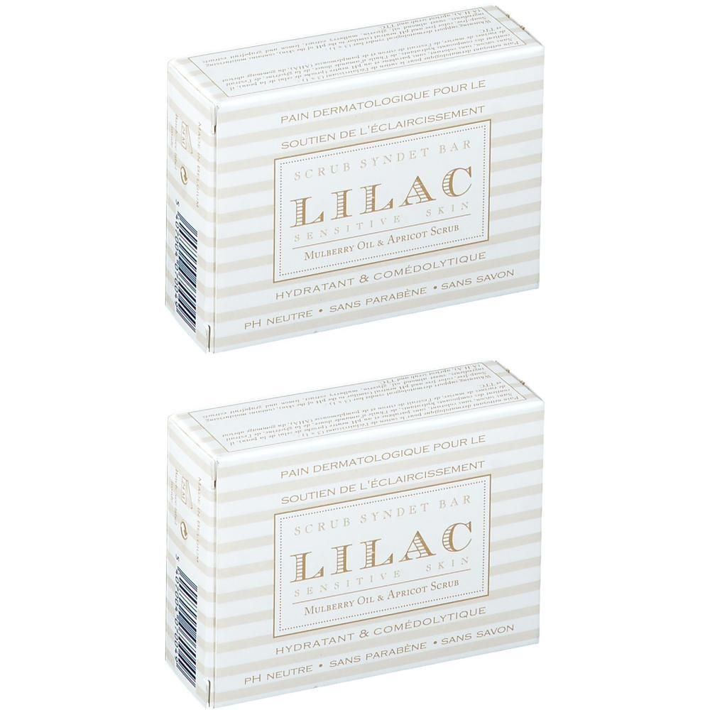 Deux paquets de savon Lilac Dermatologique Éclaircissant Gommant, rayés blanc et lilas.