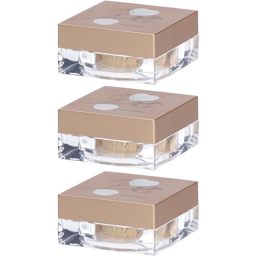 Drie potjes los minerale highlighter. Duidelijke vierkante potjes met gouden deksels en bloemenpatroon.